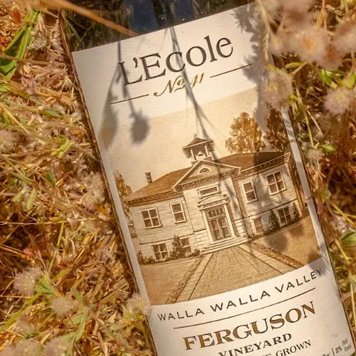 A magazine cover reading &ldquo;Ferguson&rdquo; and &ldquo;Walla Walla Valley&rdquo; lies in grassy straw.